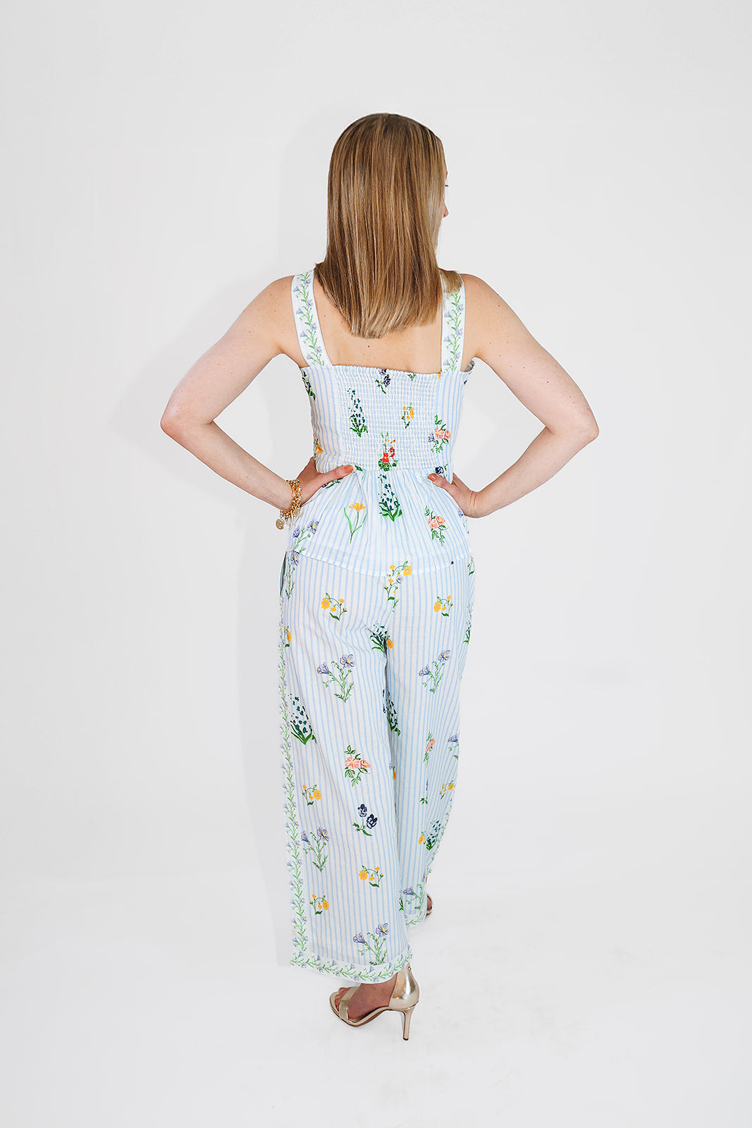 model in floral pants