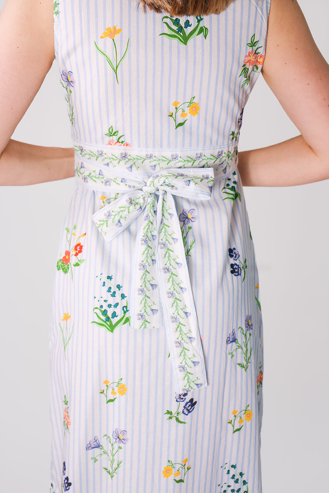 back of model in wrap dress