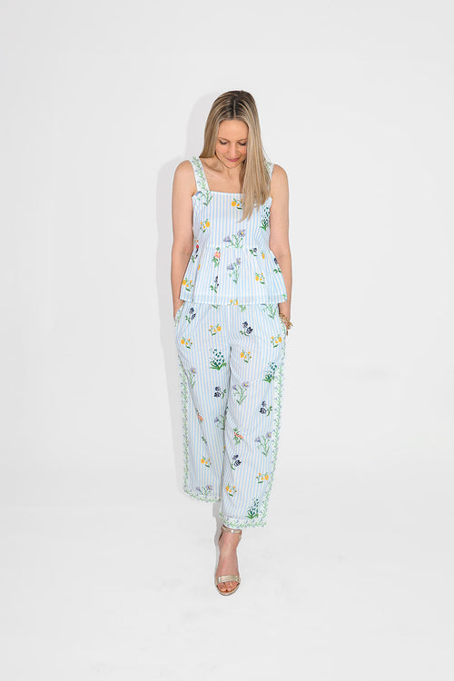 model in floral pants